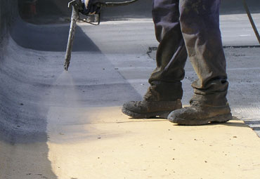 Coating systems over Houston spray foam roof systems