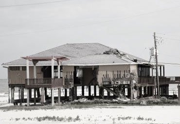 Wind damage - spray foam can help prevent uplift to Houston roofs